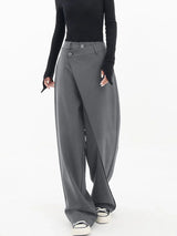 Pantalon large asymétrique avec boutons