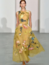 Robe longue jaune à imprimé floral et col rond