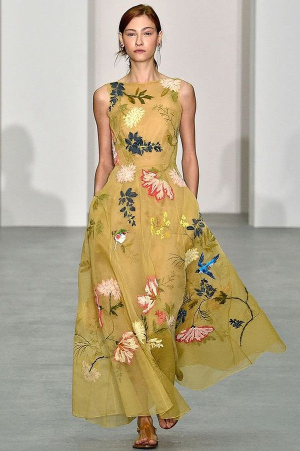 Robe longue jaune à imprimé floral et col rond